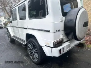 2002 Mercedes-Benz G-Class with VIN WDCYR49E22X132146, listed as a Copart auction lot 87416074 with 208,917 mi miles and Salvage Title. Bid and sale history available at carsss.com. Image 3.