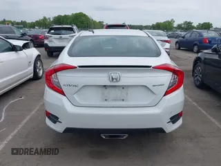 2021 Honda Civic Sport z VIN 2HGFC2F82MH511755, wystawiony jako IAAI lot #41990160 z przebiegiem 44 277 mil mil oraz . Historia ofert i sprzedaży dostępna na DreamBid. Obrazek 16.