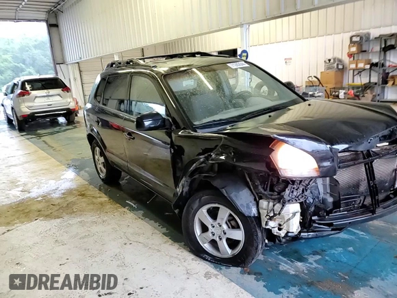 2005 Hyundai Tucson GL with VIN KM8JM12BX5U205060, listed as a Copart auction lot 71282644 with 243,076 mi miles and Salvage Title. Bid and sale history available at carsss.com. Image 12.