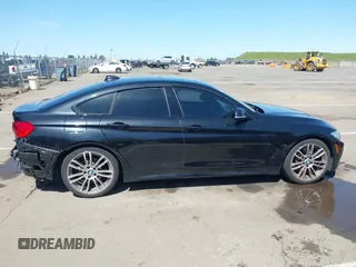 2015 BMW 4 Series 428i z VIN WBA4A9C52FGL86332, wystawiony jako IAAI lot #41970189 z przebiegiem 112 282 mil mil oraz . Historia ofert i sprzedaży dostępna na DreamBid. Obrazek 14.