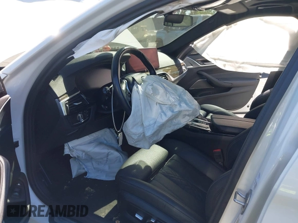 2023 BMW 5 Series 530e with VIN WBA13AG02PCN16602, listed as a IAAI auction lot 42394701 with Not provided miles and . Bid and sale history available at DreamBid. Image 5.