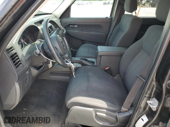 2011 Jeep Liberty Sport with VIN 1J4PN2GK5BW522989, listed as a Copart auction lot 62014165 with 149,506 mi miles and Salvage title. Bid and sale history available at DreamBid. Image 7.