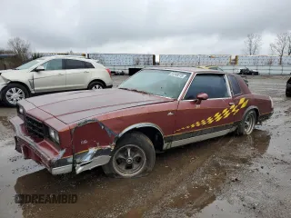 1981 Chevrolet Monte Carlo z VIN 1G1AZ37K7BB423127, wystawiony jako Copart lot #51288275 z przebiegiem 86 962 mil mil oraz Tytuł czysty. Historia ofert i sprzedaży dostępna na DreamBid. Obrazek 1.