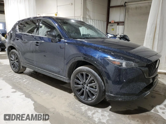 2022 Mazda CX-5 2.5 Turbo with VIN JM3KFBAY1N0636626, listed as a Copart auction lot 52257685 with 41,329 mi miles and Salvage Title. Bid and sale history available at carsss.com. Image 4.