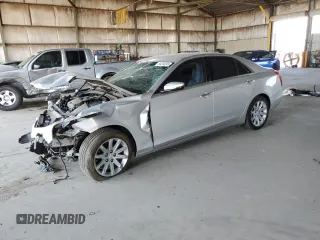 2015 Cadillac CTS RWD with VIN 1G6AP5SX3F0137081, listed as a Copart auction lot 65294245 with 58,957 mi miles and Salvage title. Bid and sale history available at DreamBid. Image 1.
