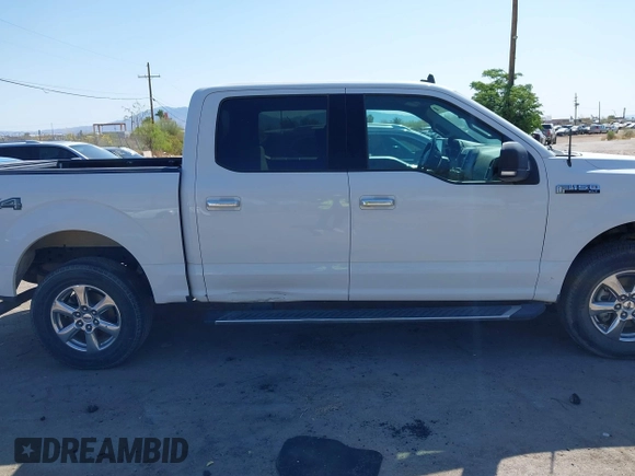 2020 Ford F-150 XL with VIN 1FTEW1E40LFA27089, listed as a IAAI auction lot 41978241 with 132,145 mi miles and . Bid and sale history available at DreamBid. Image 14.