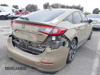 2025 Honda Civic Sport Touring z VIN 19XFL4H98SE001953, wystawiony jako IAAI lot #42024904 z przebiegiem 4 868 mil mil oraz . Historia ofert i sprzedaży dostępna na DreamBid. Obrazek 4.