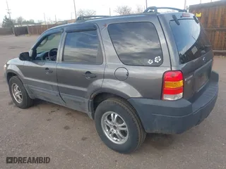 2006 Ford Escape XLT with VIN 1FMYU93126KC04632, listed as a IAAI auction lot 41912068 with 133,216 mi miles. Bid and sale history available at carsss.com. Image 3.