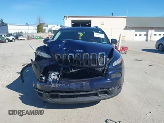 2015 Jeep Cherokee Latitude with VIN 1C4PJMCB3FW652553, listed as a IAAI auction lot 41881238 with 161,944 mi miles and . Bid and sale history available at DreamBid. Image 12.