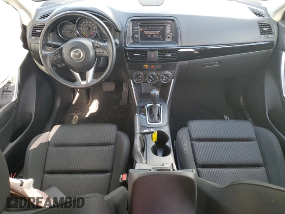 2014 Mazda CX-5 Touring z VIN JM3KE2CY0E0412733, wystawiony jako Copart lot #55803865 z przebiegiem 161 539 mil mil oraz Szkoda całkowita • Salvage title. Historia ofert i sprzedaży dostępna na DreamBid. Obrazek 8.