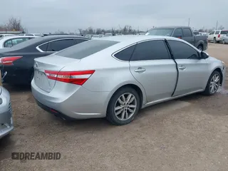 2013 Toyota Avalon XLE with VIN 4T1BK1EB4DU053880, listed as a IAAI auction lot 41605330 with 266,336 mi miles and . Bid and sale history available at DreamBid. Image 4.