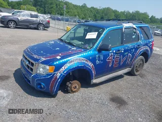 2011 Ford Escape XLT with VIN 1FMCU9D70BKA12908, listed as a IAAI auction lot 42425419 with 286,179 mi miles and . Bid and sale history available at DreamBid. Image 2.
