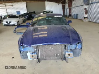 2014 Ford Mustang GT with VIN 1ZVBP8CF2E5327767, listed as a Copart auction lot 56540555 with 104,487 mi miles and Salvage title. Bid and sale history available at DreamBid. Image 5.