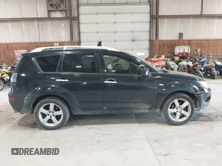 2007 Mitsubishi Outlander XLS z VIN JA4MT41X87Z001991, wystawiony jako IAAI lot #42200951 z przebiegiem 202 866 mil mil oraz . Historia ofert i sprzedaży dostępna na DreamBid. Obrazek 13.