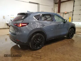 2024 Mazda CX-5 S Carbon Edition with VIN JM3KFBCL1R0434750, listed as a Copart auction lot 48587375 with 6,705 mi miles and Clean Title. Bid and sale history available at DreamBid. Image 3.