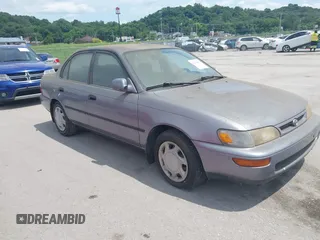 1997 Toyota Corolla DX with VIN 1NXBB02E2VZ660838, listed as a IAAI auction lot 42570894 with Not provided miles and . Bid and sale history available at DreamBid. Image 1.