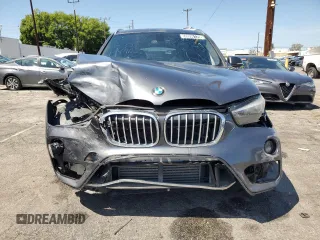 2016 BMW X1 xDrive28i with VIN WBXHT3C35GP882899, listed as a Copart auction lot 50096125 with 0 mi miles and Clean Title. Bid and sale history available at carsss.com. Image 5.