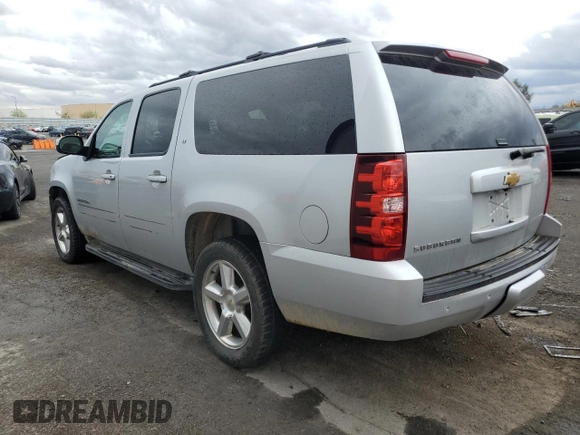 2013 Chevrolet Suburban LT with VIN 1GNSCJE07DR305437, listed as a Copart auction lot 55346605 with 160,518 mi miles and Salvage title. Bid and sale history available at DreamBid. Image 2.