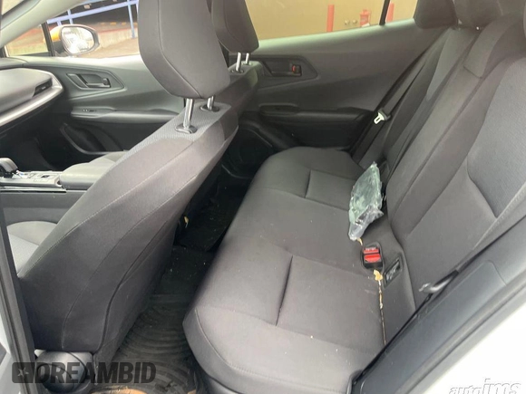 2024 Toyota Prius LE z VIN JTDACAAU4R3021349, wystawiony jako IAAI lot #42545064 z przebiegiem 12 283 mil mil oraz . Historia ofert i sprzedaży dostępna na DreamBid. Obrazek 1.