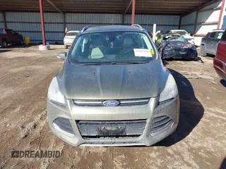 2014 Ford Escape Titanium with VIN 1FMCU9J96EUA15990, listed as a IAAI auction lot 41667046 with 203,202 mi miles. Bid and sale history available at carsss.com. Image 12.
