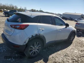 2018 Mazda CX-3 Touring with VIN JM1DKFC71J1305316, listed as a Copart auction lot 88087095 with 68,279 mi miles and Salvage Title. Bid and sale history available at DreamBid. Image 3.