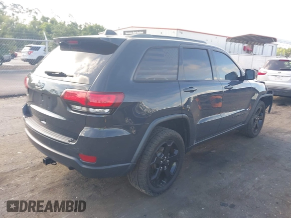 2018 Jeep Grand Cherokee Altitude with VIN 1C4RJFAG7JC394051, listed as a IAAI auction lot 42492771 with 147,669 mi miles and . Bid and sale history available at DreamBid. Image 4.
