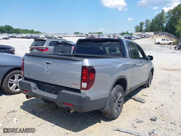 2021 Honda Ridgeline Sport with VIN 5FPYK3F10MB021413, listed as a IAAI auction lot 39847416 with 28,044 mi miles. Bid and sale history available at carsss.com. Image 4.