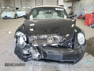 2013 Volkswagen Beetle 2.5L с VIN 3VW5P7AT5DM811974, выставлен на аукционе Copart как лот 56853015 с пробегом 68 959 миль миль и На запчасти • Non repairable. История ставок и продаж доступна на DreamBid. Изображение 5.