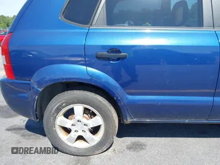 2005 Hyundai Tucson GL with VIN KM8JM12B85U233228, listed as a IAAI auction lot 42051627 with 170,742 mi miles. Bid and sale history available at carsss.com. Image 13.