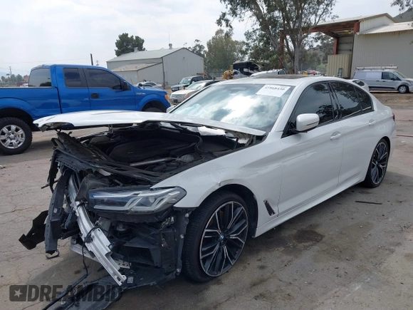 2021 BMW 5 Series 540i z VIN WBA53BJ07MWW92703, wystawiony jako IAAI lot #41868430 z przebiegiem Nie podano mil oraz . Historia ofert i sprzedaży dostępna na DreamBid. Obrazek 2.