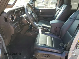 2024 Jeep Wrangler Sahara z VIN 1C4PJXEG9RW242600, wystawiony jako Copart lot #49297285 z przebiegiem 11 391 mil mil oraz Szkoda całkowita • Salvage title. Historia ofert i sprzedaży dostępna na DreamBid. Obrazek 7.