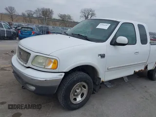 2003 Ford F-150 XL with VIN 1FTRX18L73NB72735, listed as a IAAI auction lot 42016567 with 0 mi miles. Bid and sale history available at carsss.com. Image 13.