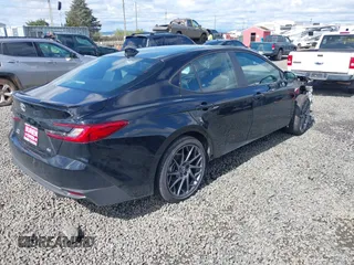 2025 Toyota Camry LE z VIN 4T1DBADK4SU011099, wystawiony jako IAAI lot #41949441 z przebiegiem 1 548 mil mil oraz . Historia ofert i sprzedaży dostępna na DreamBid. Obrazek 4.