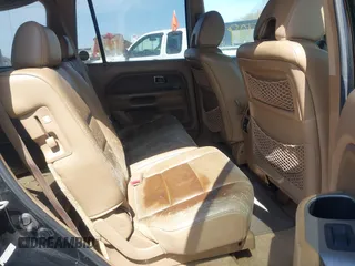 2006 Honda Pilot EX-L with VIN 2HKYF18746H527298, listed as a IAAI auction lot 41941429 with 153,482 mi miles and . Bid and sale history available at DreamBid. Image 8.