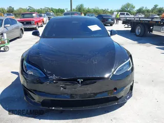 2023 Tesla Model S Plaid with VIN 5YJSA1E67PF528171, listed as a IAAI auction lot 41831086 with Not provided miles and . Bid and sale history available at DreamBid. Image 11.