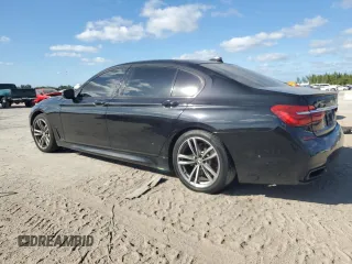 2017 BMW 7 Series 740i with VIN WBA7E2C51HG739462, listed as a Copart auction lot 84157364 with 137,881 mi miles and Salvage Title. Bid and sale history available at carsss.com. Image 2.