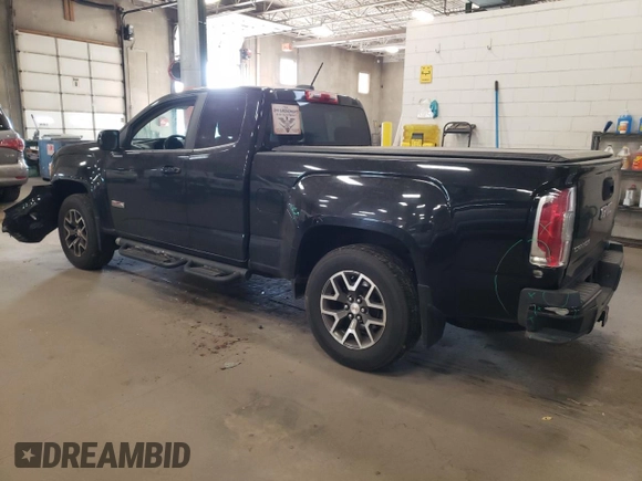 2015 GMC Canyon 4WD SLE with VIN 1GTH6BE32F1168788, listed as a Copart auction lot 76972934 with 158,562 mi miles and Salvage Title. Bid and sale history available at carsss.com. Image 2.
