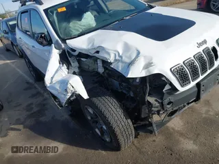 2019 Jeep Cherokee Trailhawk Elite with VIN 1C4PJMBX7KD410612, listed as a IAAI auction lot 41878935 with 55,163 mi miles. Bid and sale history available at carsss.com. Image 6.
