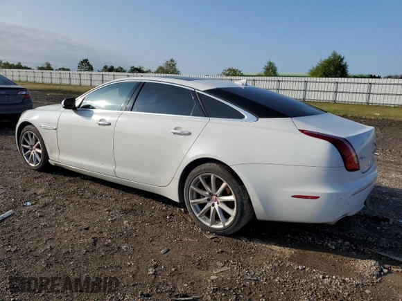 2014 Jaguar XJ Portfolio with VIN SAJWA2GZ3E8V60788, listed as a Copart auction lot 43272405 with 97,196 mi miles and Salvage title. Bid and sale history available at DreamBid. Image 2.