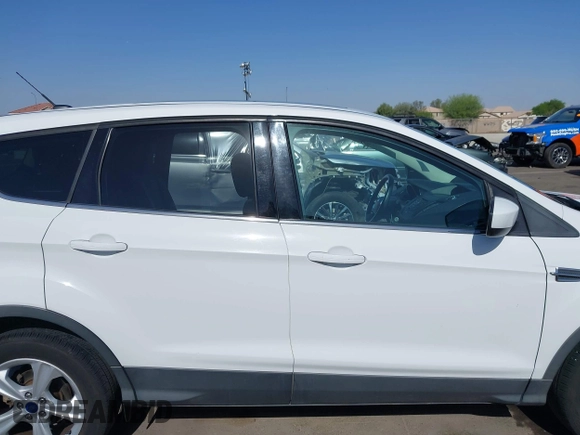 2015 Ford Escape z VIN 1FMTU0G90FUA81004, wystawiony jako IAAI lot #42261648 z przebiegiem 169 989 mil mil oraz . Historia ofert i sprzedaży dostępna na DreamBid. Obrazek 14.