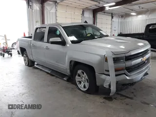 2017 Chevrolet Silverado 1500 LT with VIN 3GCUKREC2HG473554, listed as a IAAI auction lot 42220143 with 80,000 mi miles and . Bid and sale history available at DreamBid. Image 1.