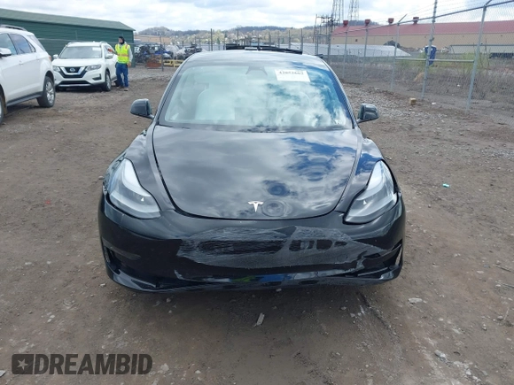 2021 Tesla Model 3 Long Range with VIN 5YJ3E1EB7MF052988, listed as a IAAI auction lot 42052662 with 29,877 mi miles and . Bid and sale history available at carsss.com. Image 12.