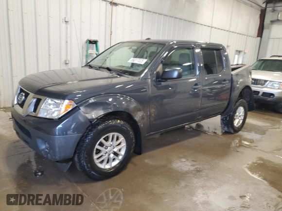 2015 Nissan Frontier Pro-4X with VIN 1N6AD0EV8FN703027, listed as a Copart auction lot 55217005 with 175,794 mi miles and Salvage title. Bid and sale history available at DreamBid. Image 1.