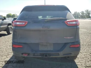 2017 Jeep Cherokee Trailhawk L Plus with VIN 1C4PJMBS4HD237094, listed as a Copart auction lot 61051675 with 104,852 mi miles and Salvage title. Bid and sale history available at DreamBid. Image 6.