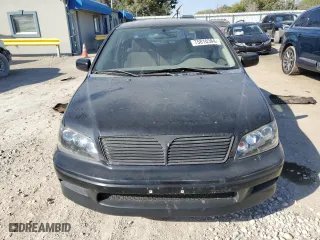 2002 Mitsubishi Lancer ES with VIN JA3AJ26E72U062280, listed as a Copart auction lot 75810384 with 136,149 mi miles and Salvage Title. Bid and sale history available at carsss.com. Image 5.