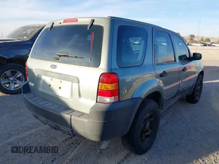 2006 Ford Escape XLS with VIN 1FMYU02ZX6KA08067, listed as a IAAI auction lot 41589342 with 166,448 mi miles and . Bid and sale history available at DreamBid. Image 4.
