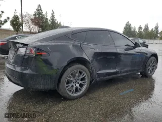 2023 Tesla Model S with VIN 5YJSA1E59PF514540, listed as a Copart auction lot 45308895 with 24,165 mi miles and Salvage Title. Bid and sale history available at carsss.com. Image 3.