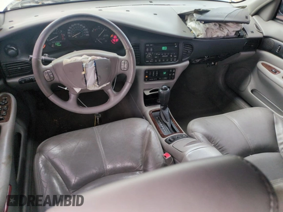 2002 Buick Regal GS с VIN 2G4WF551221293376, выставлен на аукционе Copart как лот 50914765 с пробегом Не указан миль и Списание • Salvage title. История ставок и продаж доступна на DreamBid. Изображение 8.
