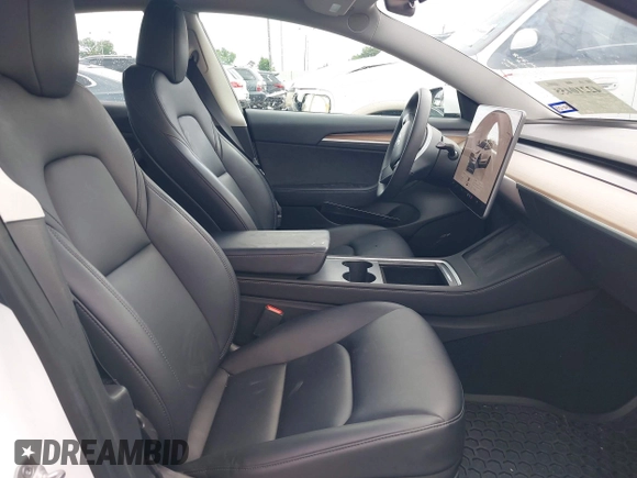2023 Tesla Model 3 z VIN 5YJ3E1EA0PF511158, wystawiony jako IAAI lot #42210455 z przebiegiem 22 291 mil mil oraz . Historia ofert i sprzedaży dostępna na DreamBid. Obrazek 5.