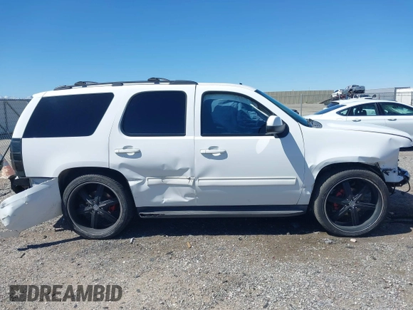 2012 Chevrolet Tahoe LS with VIN 1GNSCAE06CR141256, listed as a IAAI auction lot 41806708 with 105,984 mi miles and . Bid and sale history available at DreamBid. Image 13.